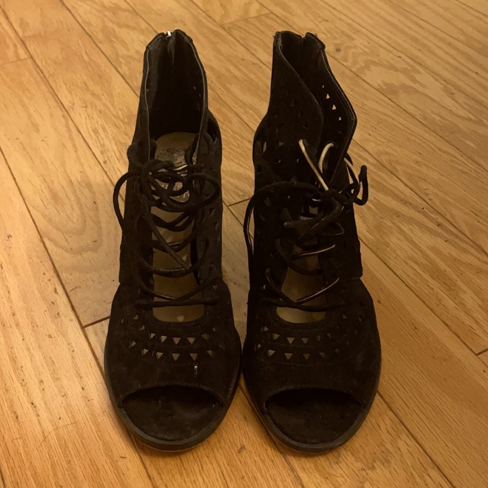 Peep toe lace up heels.